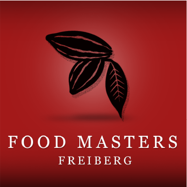 Logo FOOD MASTERS FREIBERG GMBH - Anlagen für die Kakao- und Nussindustrie